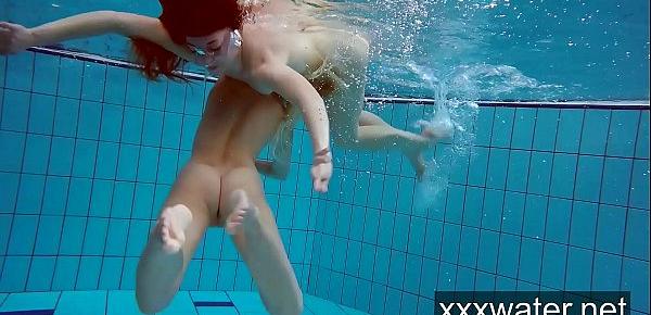  Milana and Katrin strip eachother underwater